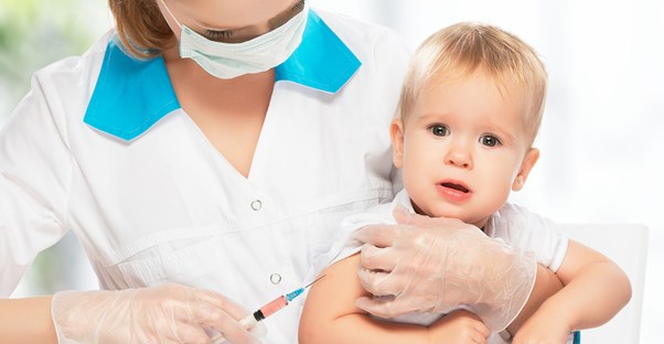 a baby getting a vaccine