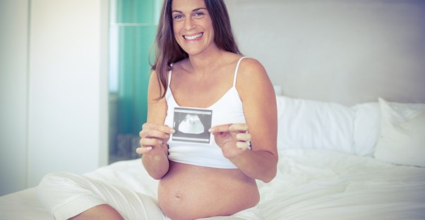 A woman with her ultrasound
