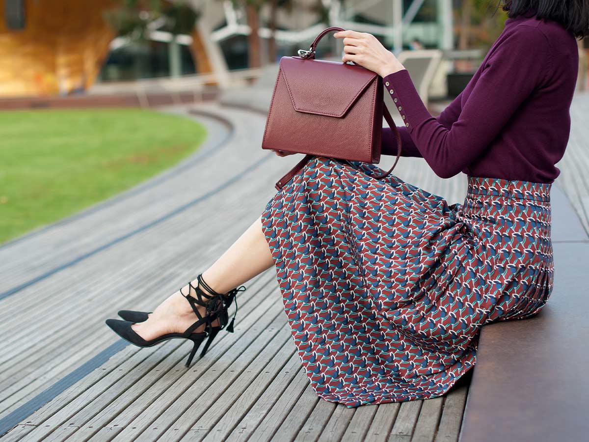 Pair Your Midi Skirt With a Sweater