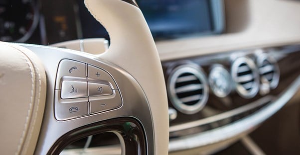 the driver's seat of a luxury car