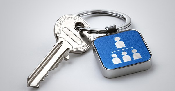 rental property key with blue keychain