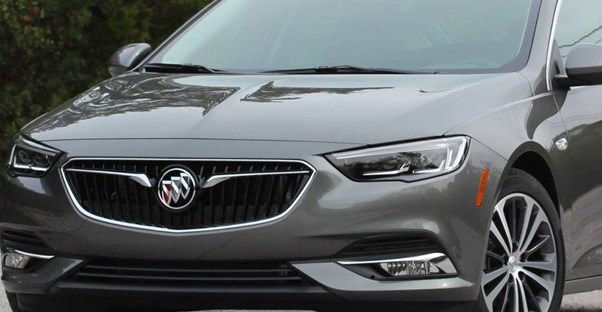 a close up view of the 2019 buick regal grille while it sits in a driveway