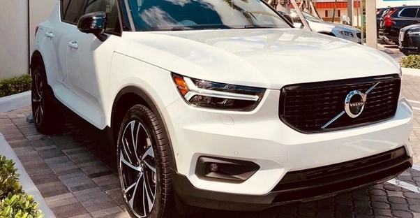 a white 2019 volvo xc40 in a driveway