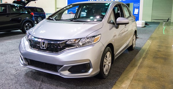 the front end of a silver 2019 honda fit