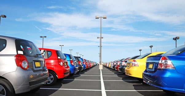 a car lot filled with vehicles that may have the best resale values