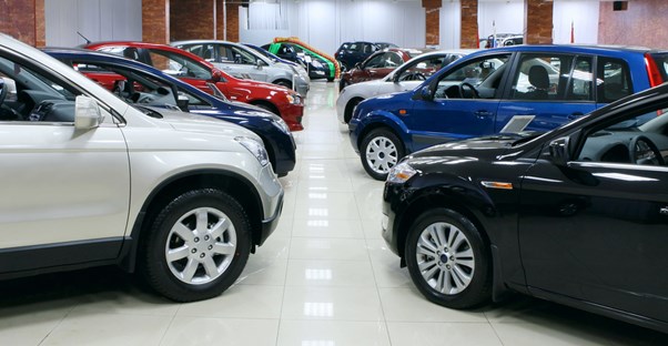 a showroom filled with new cars