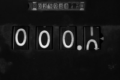 numbers rolling up on an odometer