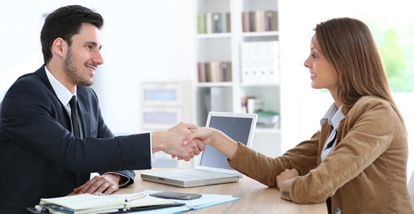 A financial advisor makes a deal with a client