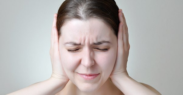 A woman struggles with hearing loss