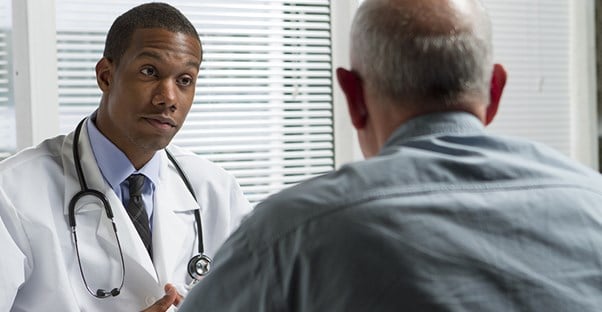 Doctor and patient discuss testicular torsion