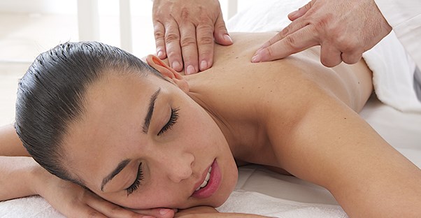 woman getting a massage because she has a trigger point