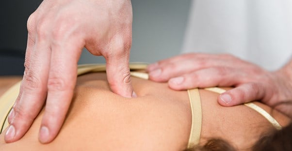 woman getting treatment for trigger points