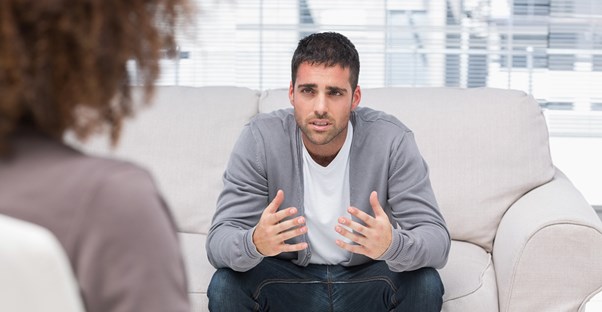 a patient discusses schizophrenia treatments with a psychologist