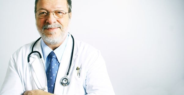 a doctor stands ready to explain the symptoms of shingles
