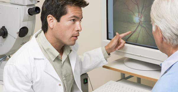 a doctor explaining glaucoma to a patient
