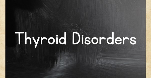 the words thyroid disorder on a chalkboard