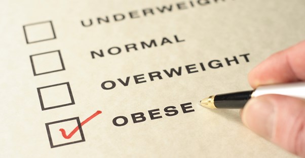 a doctor offering an obesity diagnosis