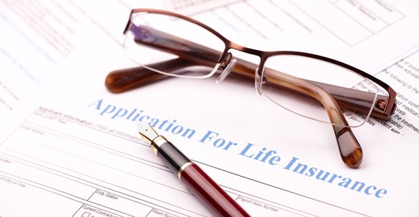 life insurance papers viewed by a person with HIV