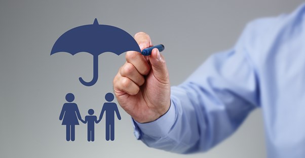 a man drawing a life insurance umbrella over a family that suffers from lupus