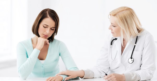 a doctor explaining a mastectomy