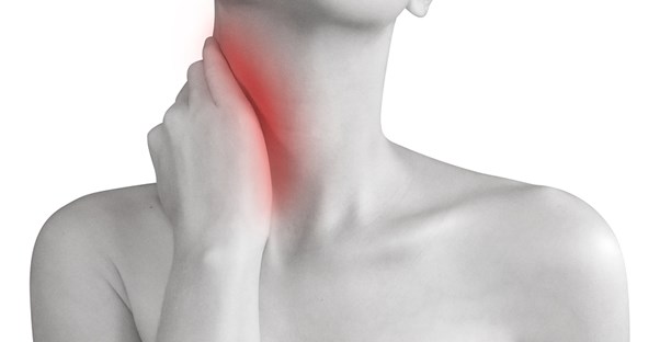 a woman experiencing neck pain