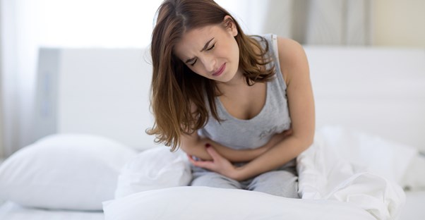 A woman ponders the causes of endometriosis