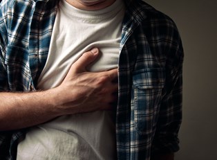 a man suffering from acid reflux