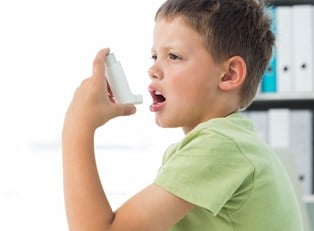 boy using an inhaler