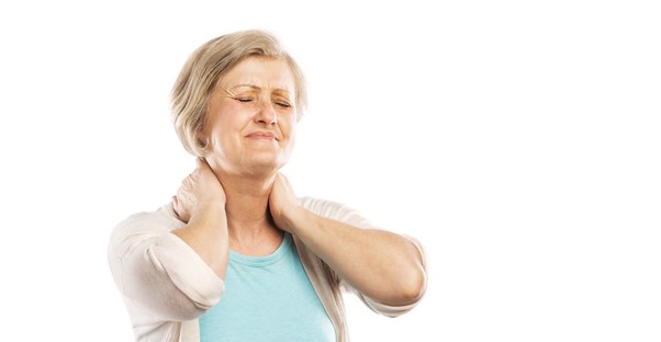 an older woman's neck aches from her fibromyalgia