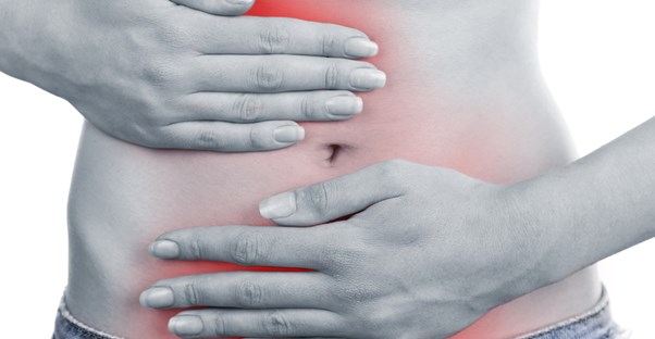 A woman suffers from inflammatory bowel disease