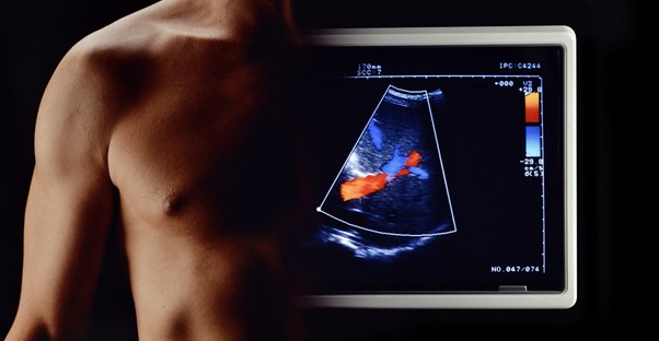 A man undergoes a diagnostic ultrasound