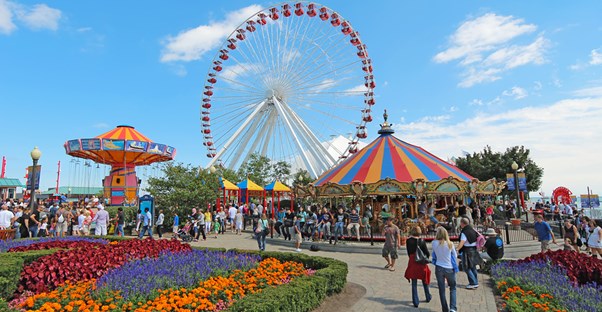 Pier Park at Navy Pier with the carousel in the foreground and Ferris wheel in the background
