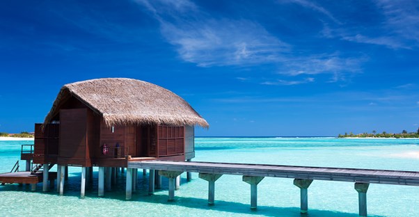 a Bora Bora bungalow situation over clear ocean water