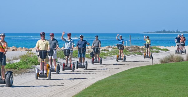 a segway tour of Sanibel Island passes by the ocean