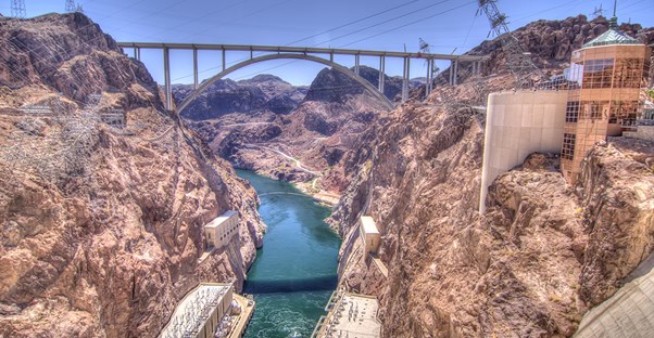 a look from the hoover dam to the bridge that crosses the valley above it