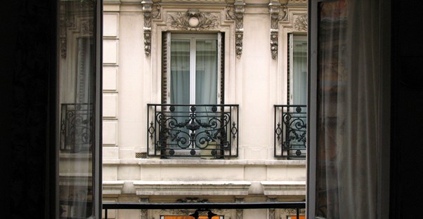 a view out of a paris hotel balcony