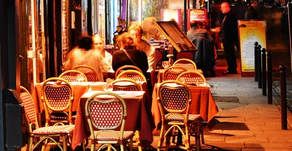 diners eat on the patio of one of Paris' famous restaurants
