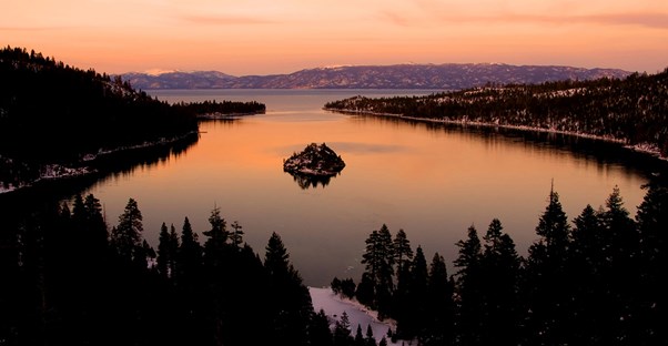 an aerial view of expansive Lake Tahoe at sunset