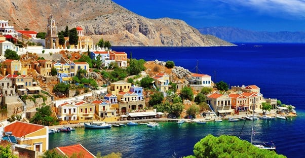 colorful vacation rental properties dot the Greek coastline