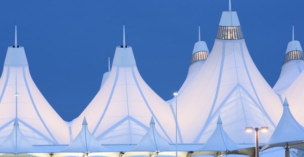 the denver airport roof design mimiking the snow-capped rock mountains nearby