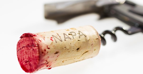 a wine cork is freshly pulled from a napa wine bottle