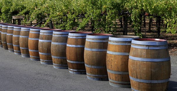 wine barrels at a winery are being readied for opening