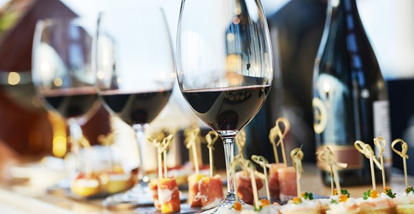 a spread of wine options and appetizers at a sonoma wine tasting