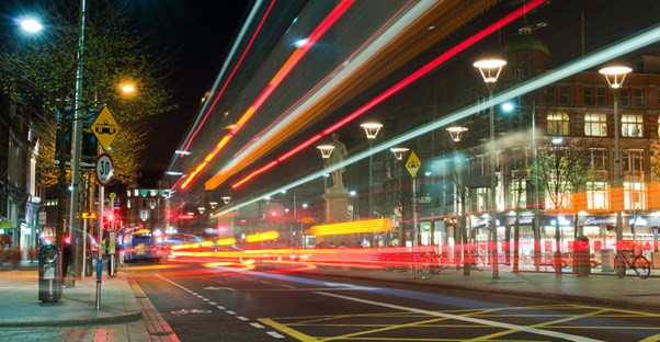 cars speed through dublin's downtown in this long-exposure shot