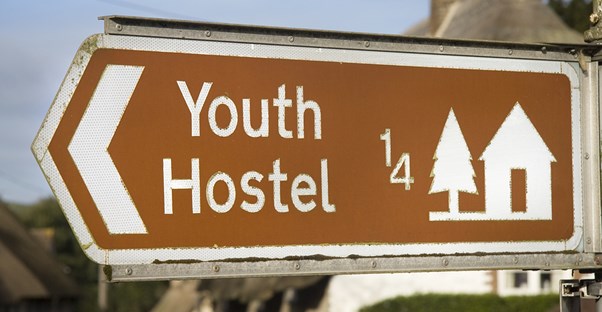 a sign for a Spanish hostel in Barcelona