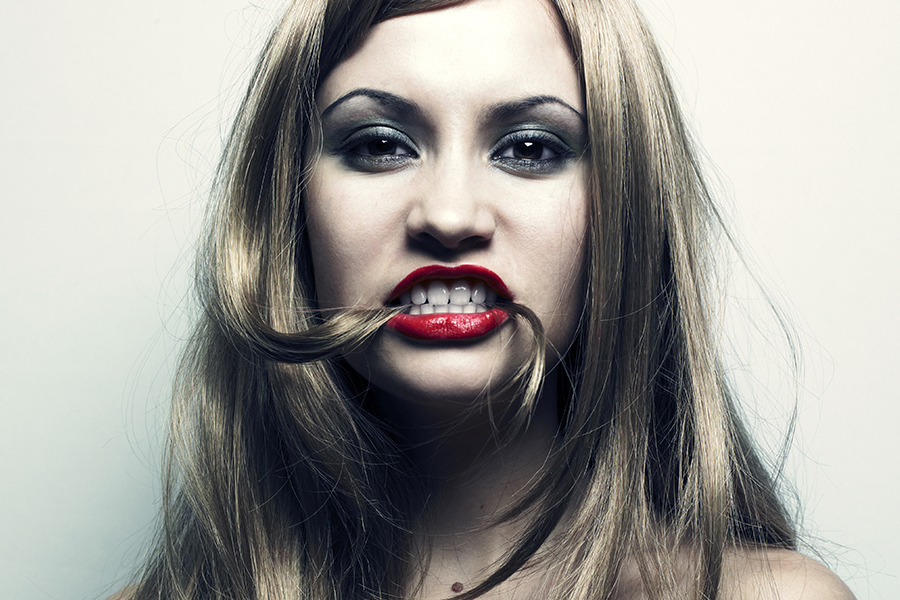 Sucking on your hair.