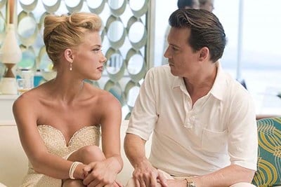 Photo of Johnny Depp and Amber Heard in the film The Rum Diary