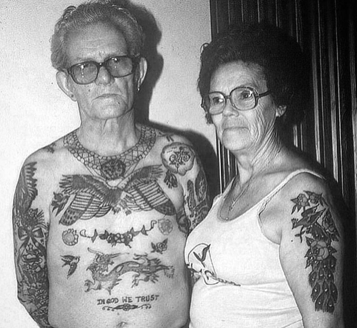 a portrait of a tattooed couple