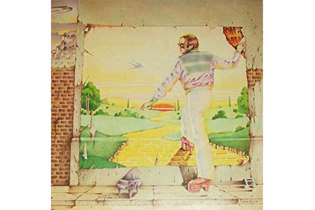 A Man Stepping Inside A Mural
