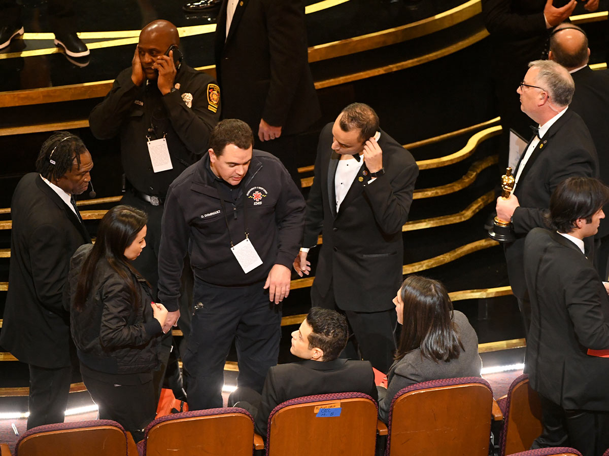 Rami Malek falls off stage